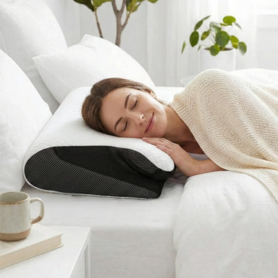 Woman sleeping on side on The Support Pillow — showing cervical alignment